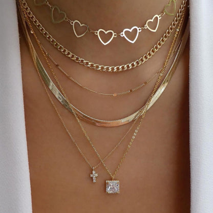 Trendsetting gold necklace featuring a collection of stunning and diverse styles"