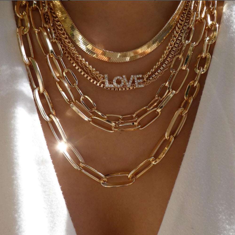 Fashion-forward gold necklace with an assortment of trendy styles